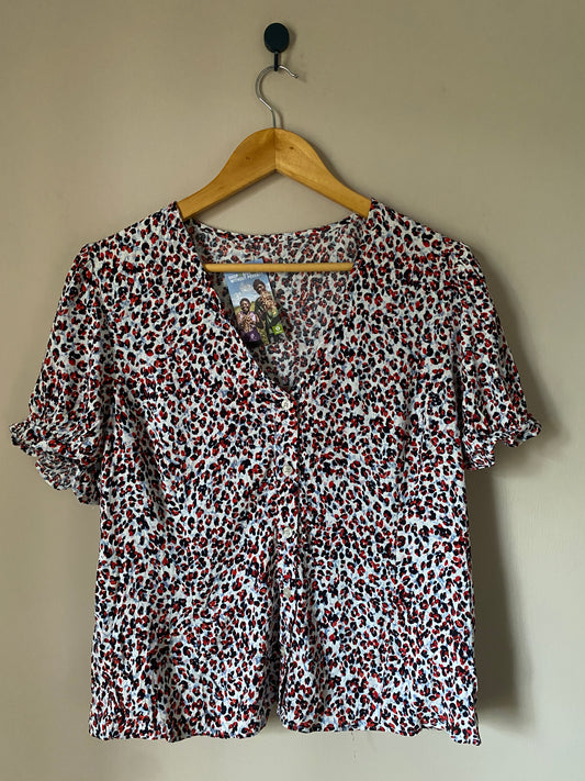 animal-print-ruffle-cuff-blouse