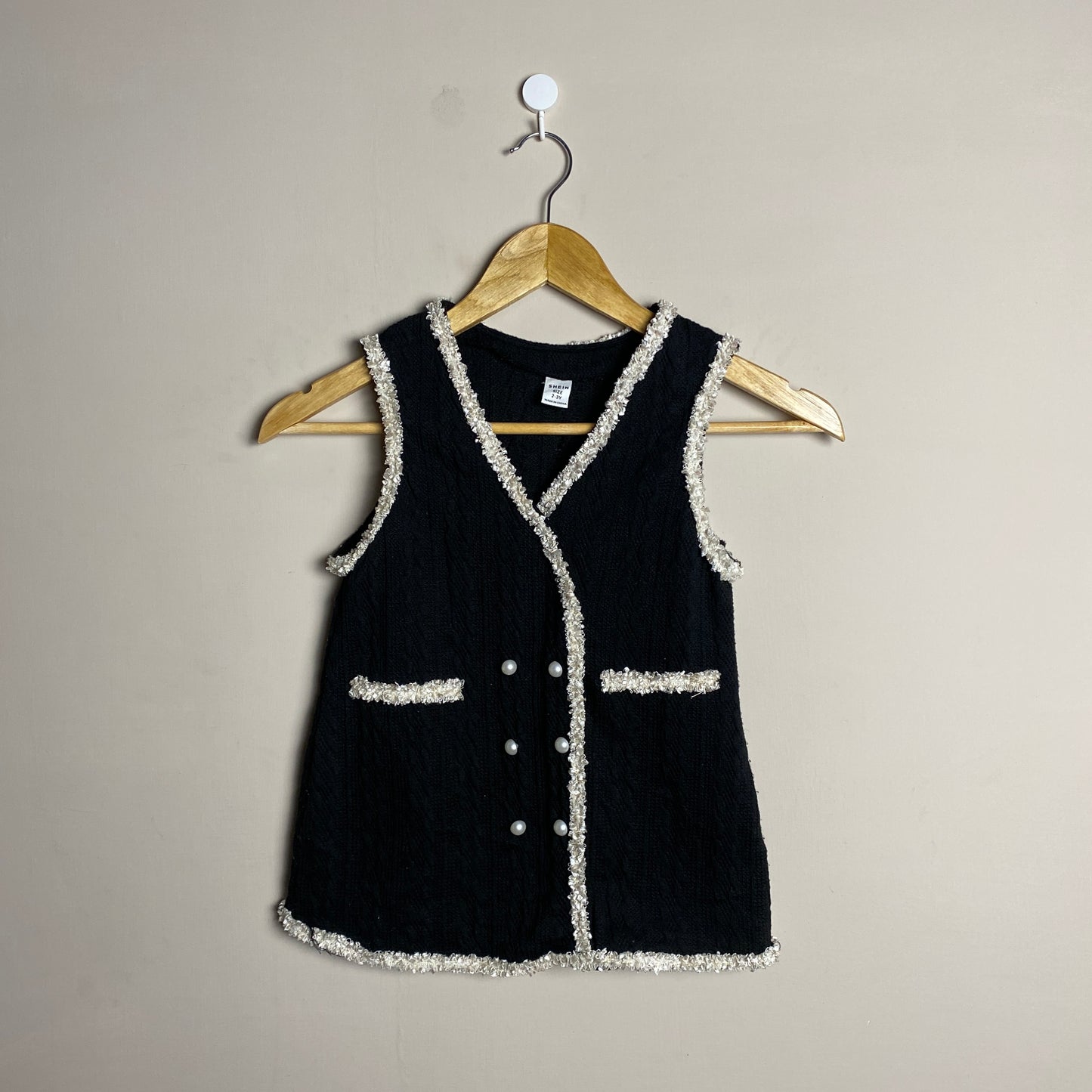 black-embellished-sleeveless-vest-132